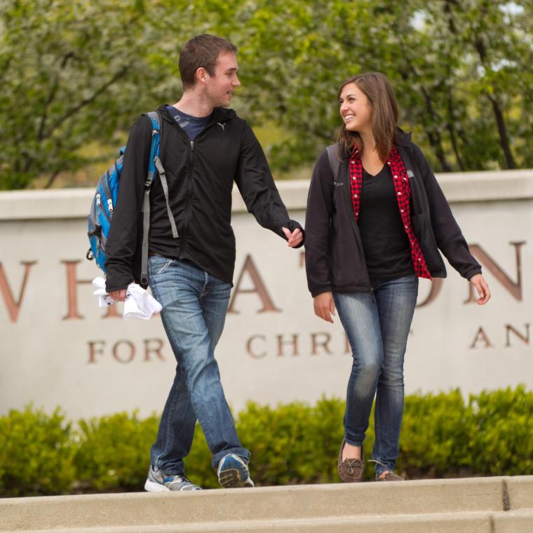 Two Wheaton College Students Walking around campus