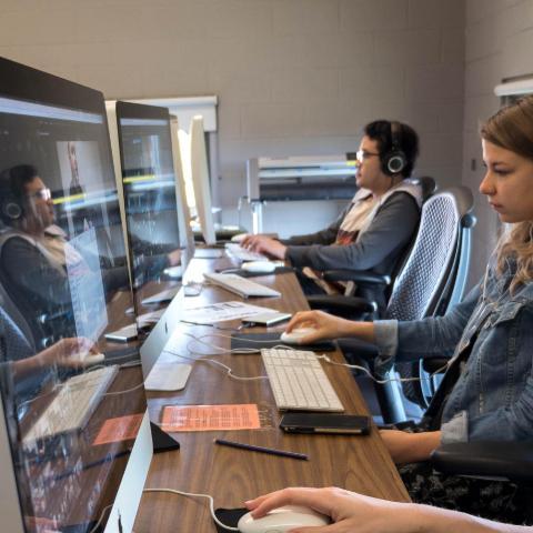 Two students in the Media Lab Communications Department at Wheaton College IL