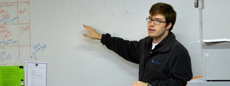 Student teacher at the white board