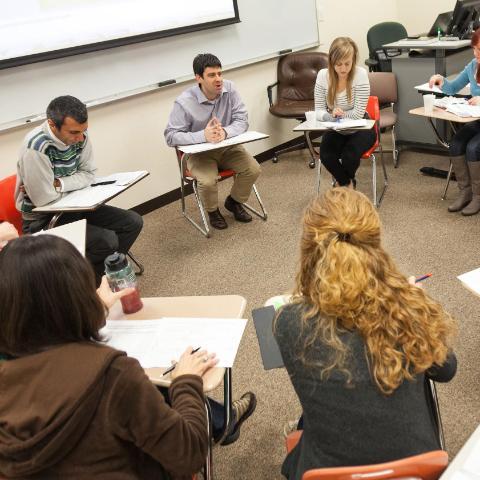 Psychology class with teacher and students