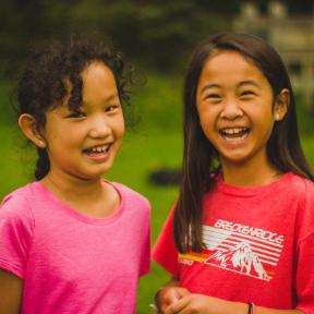 two camper girls smiling at the camera at HoneyRock