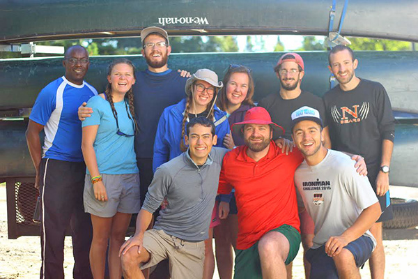 Group of students in front of canoes at Honeyrock