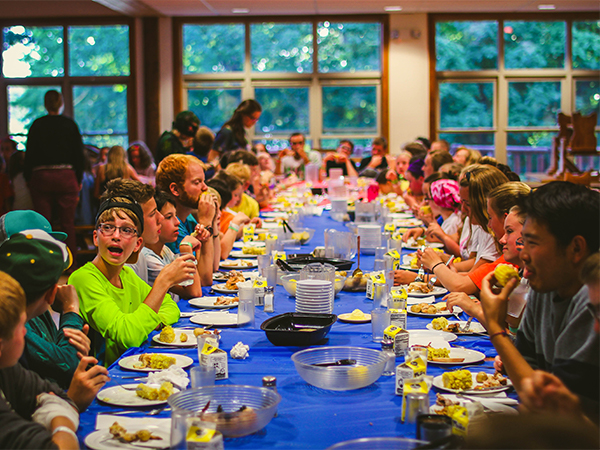 Children sitting at table in Honeyrock dining hall