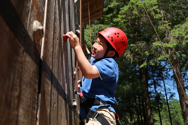 Boy climbing daytime