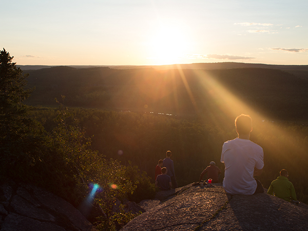 Student Sitting Staring at Sunset