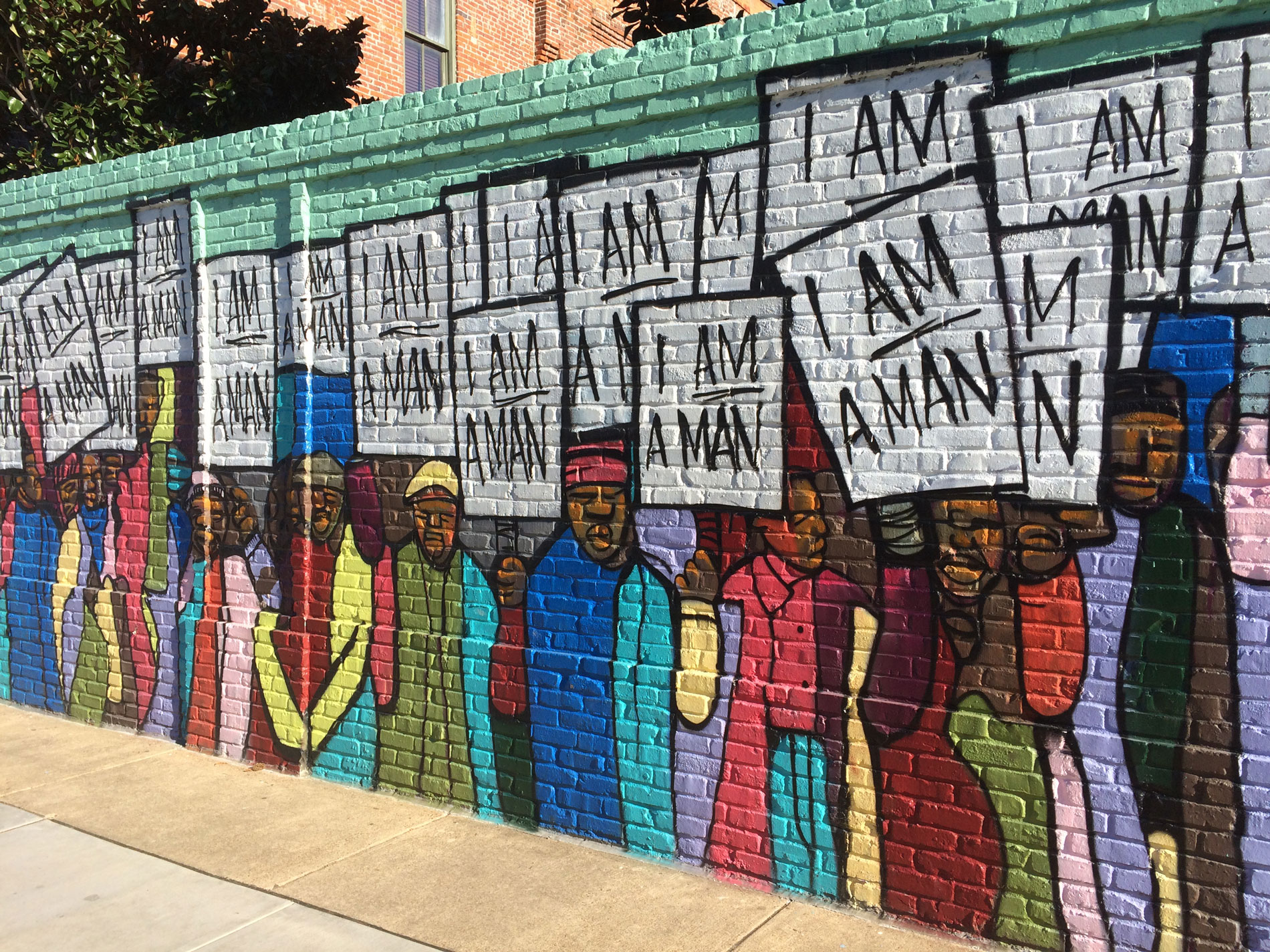 Students viewing artwork devoted to Civil Rights Movement