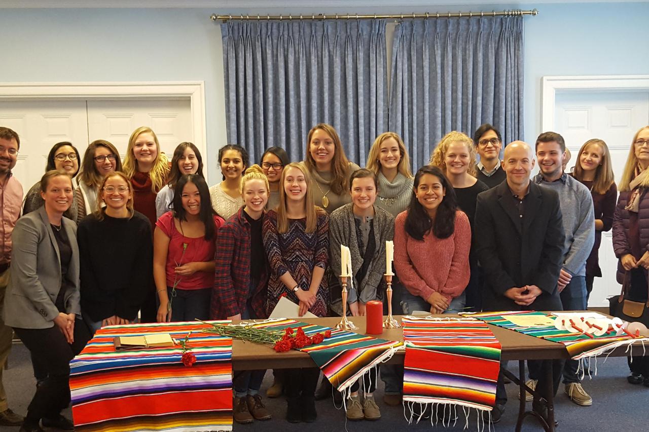 Group shot of Spanish faculty with new student members of Sigma Delta Pi.