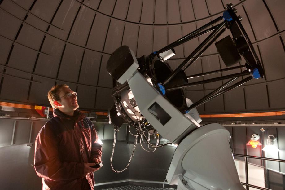 AJ Poelarends using 24-inch Planewave telescope in Wheaton College Observatory